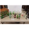 Image 1 : 24 Assorted Pop Bottles with 7 Up Crate; Orange Crush, Sun Crest, Canada Dry