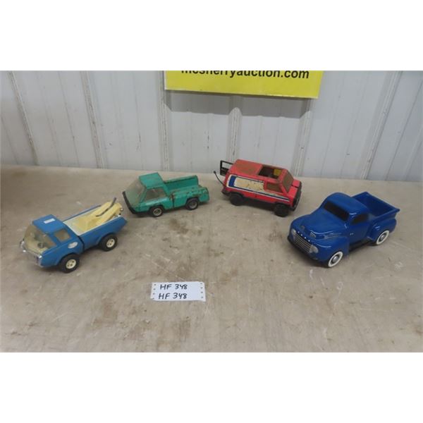 3 Pressed Steel Trucks, 1 Ceramic Ford Pick Up