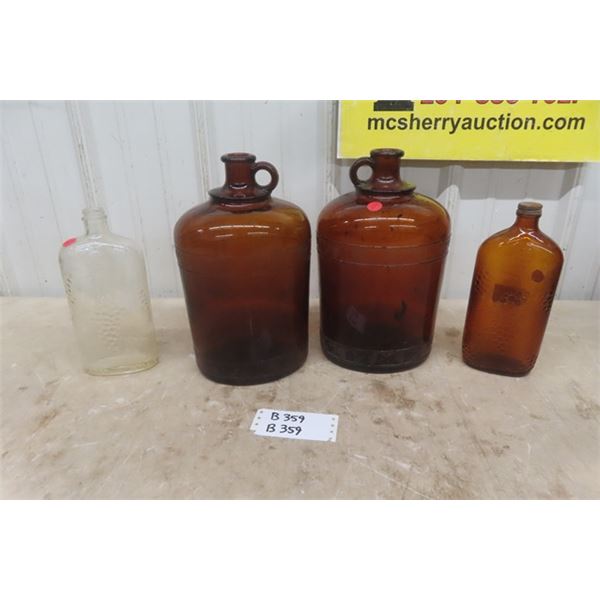 2 Large Brown Gallon Jugs + 1 Clear + 1 Brown Smaller Bottles