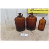 Image 1 : 2 Large Brown Gallon Jugs + 1 Clear + 1 Brown Smaller Bottles