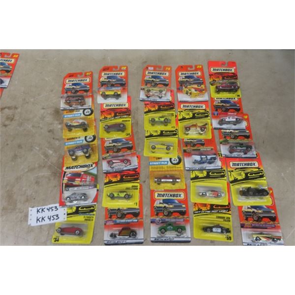 25 Assorted Matchbox Cars All New in Packages- 20 + years old