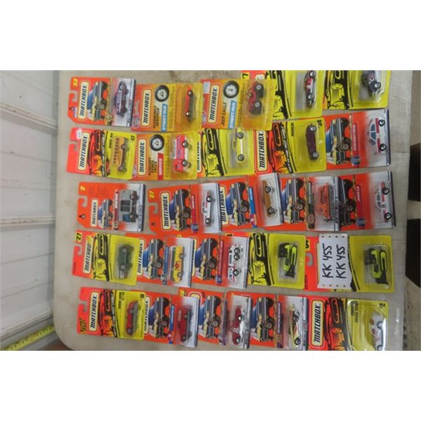 25 Assorted Matchbox Die Cast Cars New in Packages- Most are Pre 2000