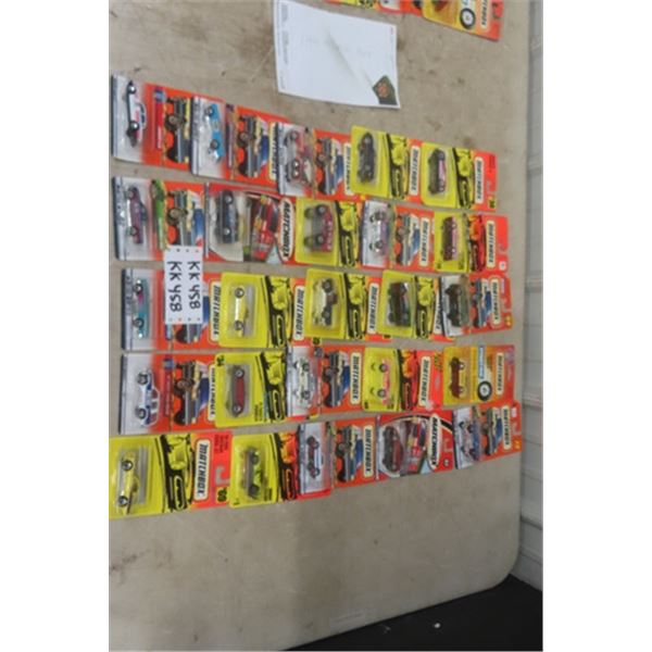 25 More Assorted Matchbox Cars New in Packages - Most Pre 2000