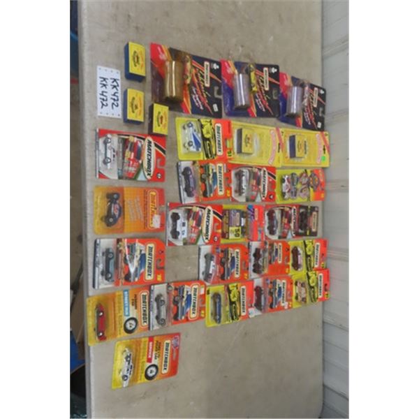 28 Assorted Matchbox Die Cast Cars New in Packages