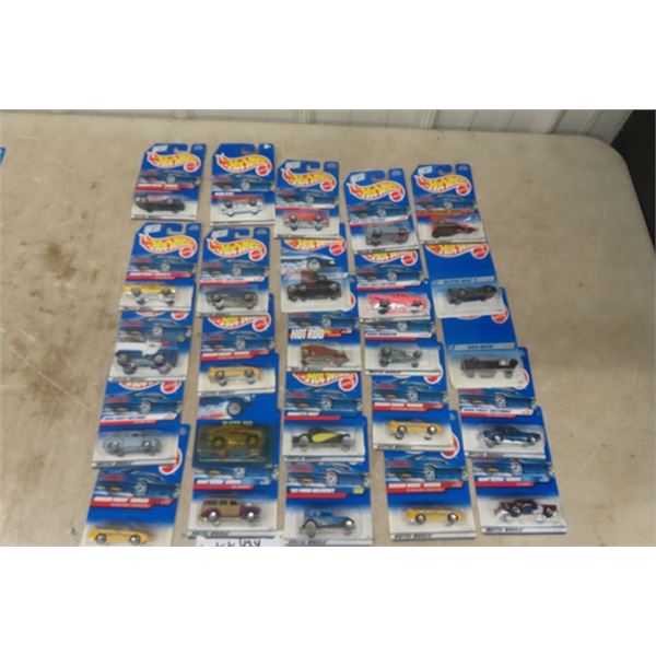 25 Assorted Hot Wheels New in Packages- Most Pre 2000