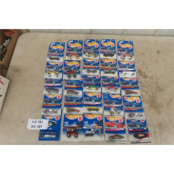 25 Assorted Hot Wheels Cars New in Packages- Most Pre 2000