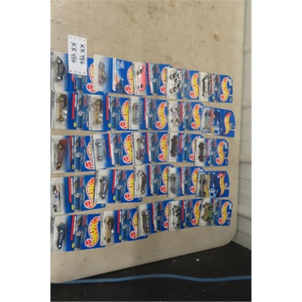 25 Assorted Hot Wheels Cars New in Packages- Most Pre 2000