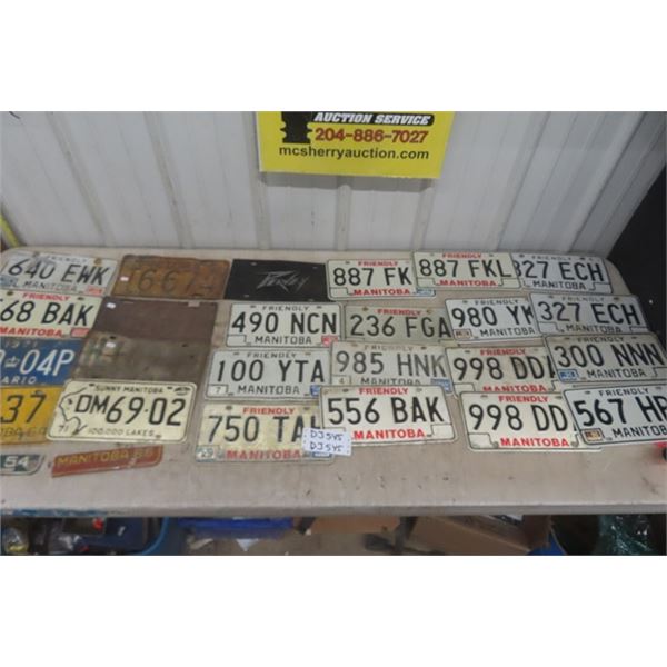 23 Assorted License Plates + 2 Plate Tags - Mostly Manitoba