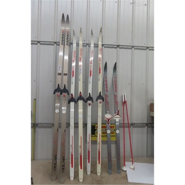 4 Pairs of Skis + 1 Set of Poles