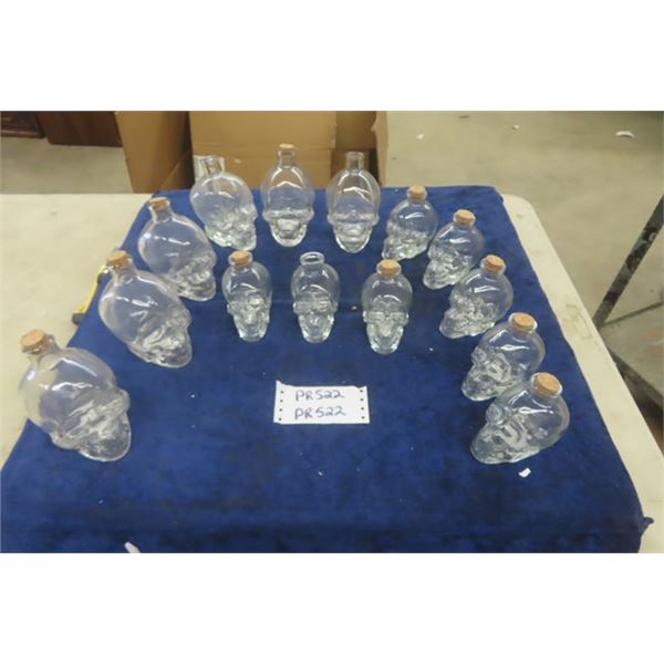 8 Small Skull Bottles, 6 Larger Skull Bottles- some with Corks 
