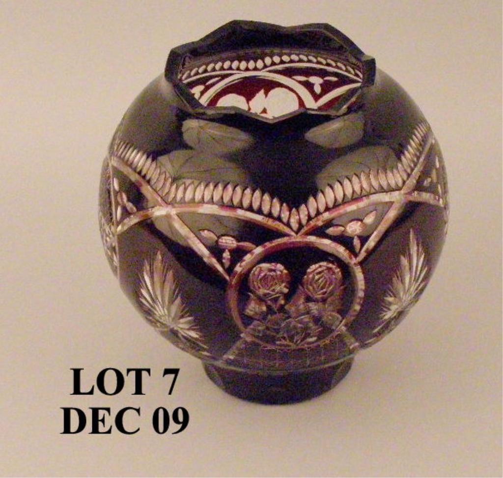 Burgundy colored cut crystal potpourri bowl.