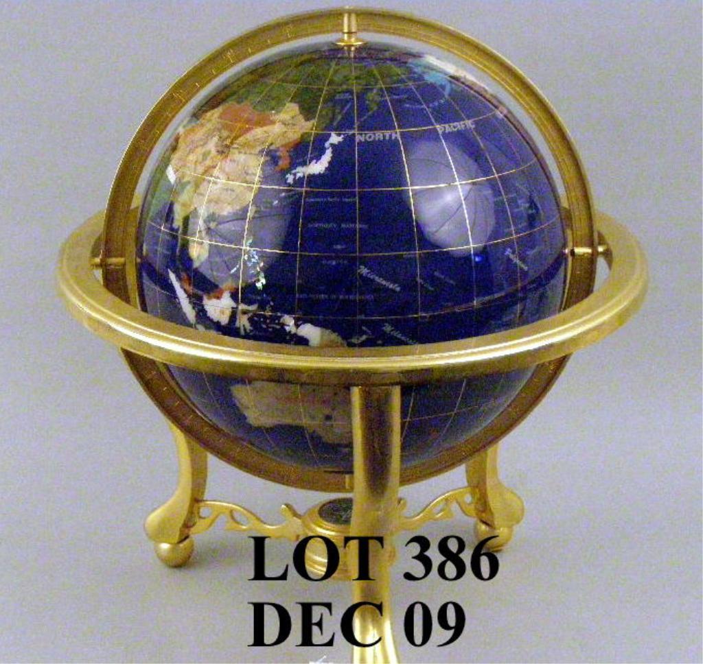 Globe made of various types of stone, pearl etc. representing different