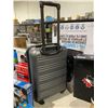 Roots suitcase wheeled with adjustable handle see pictures for damage