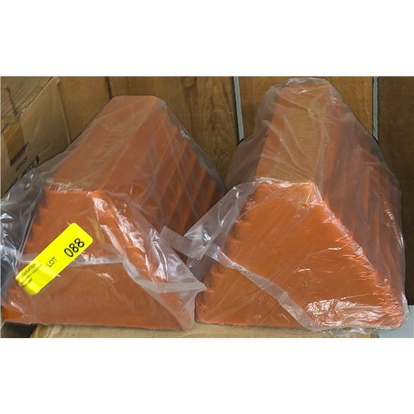 Pair of new Uline  hard rubber wheel chocks, orange