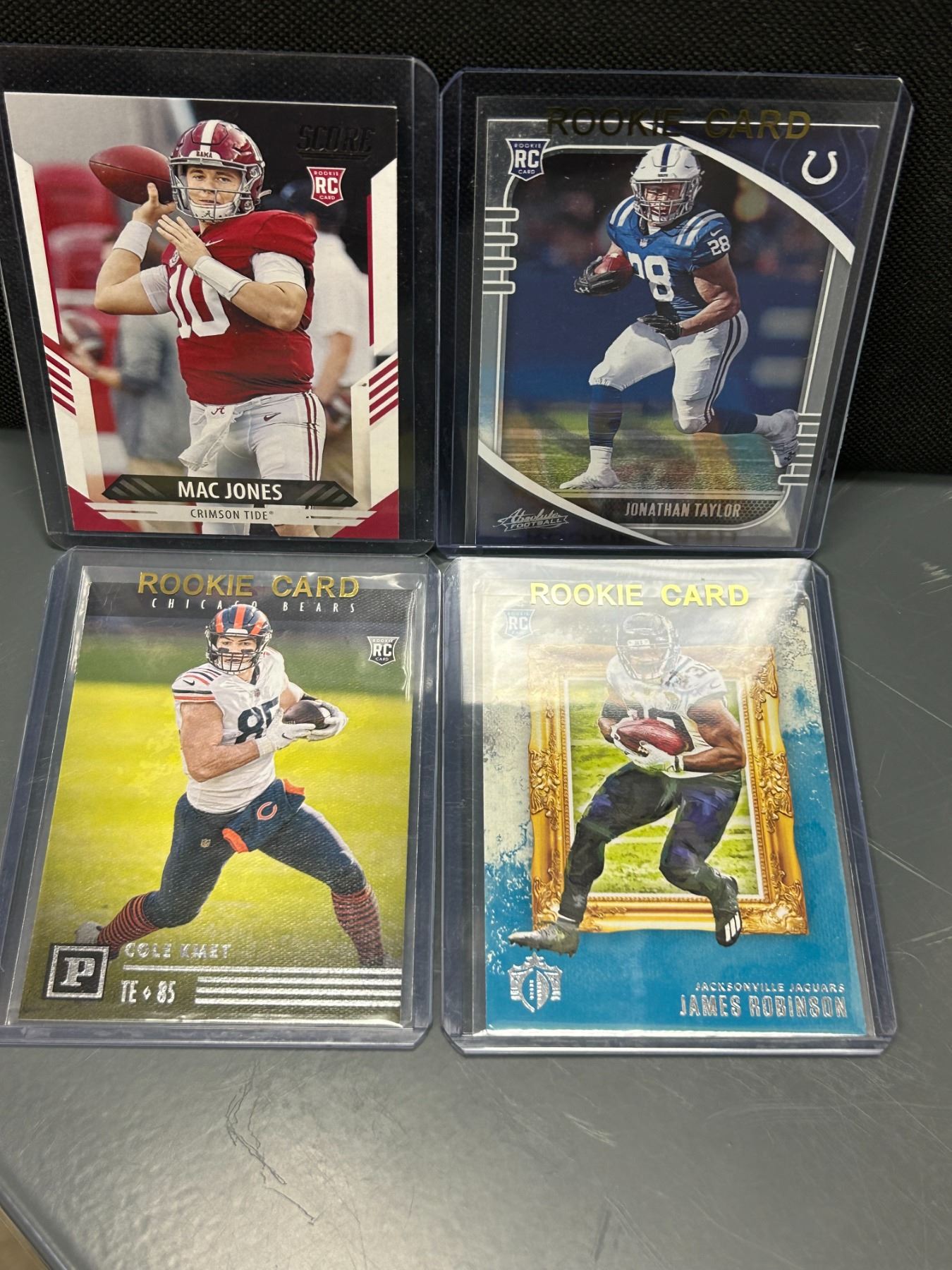 LOT OF 4 NFL FOOTBALL ROOKIE CARDS