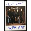 Image 1 : SIGNED EAGLES BAND 8X10 (RA COA)