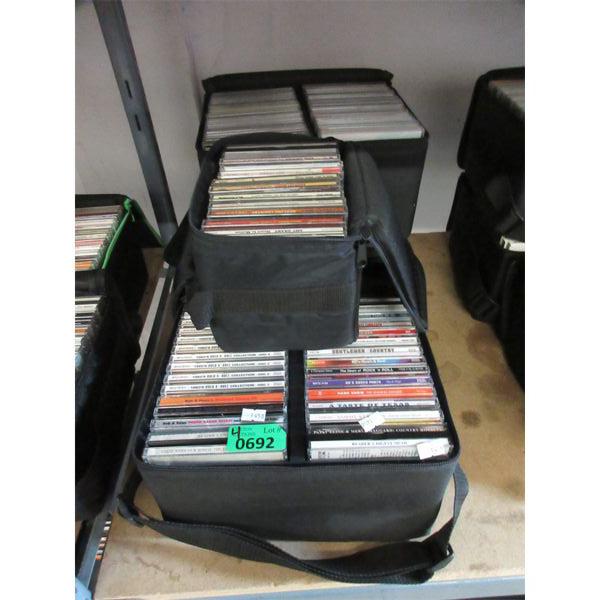 4 Storage Container of Assorted Music DVDs 