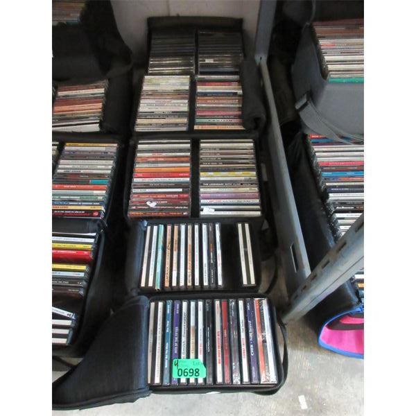 4 Storage Container of Assorted Music DVDs 