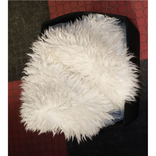 ASPEN WHITE FAUX SHEEPSKIN BLANKET IN STORAGE