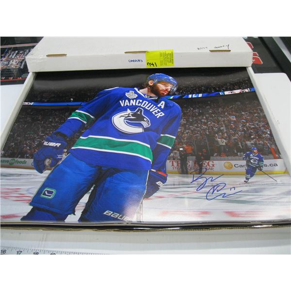 BOX OF LARGE SIGNED VANCOUVER CANUCKS PHOTOS