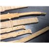 Image 2 : Group of assorted bamboo and plastic stunt swords