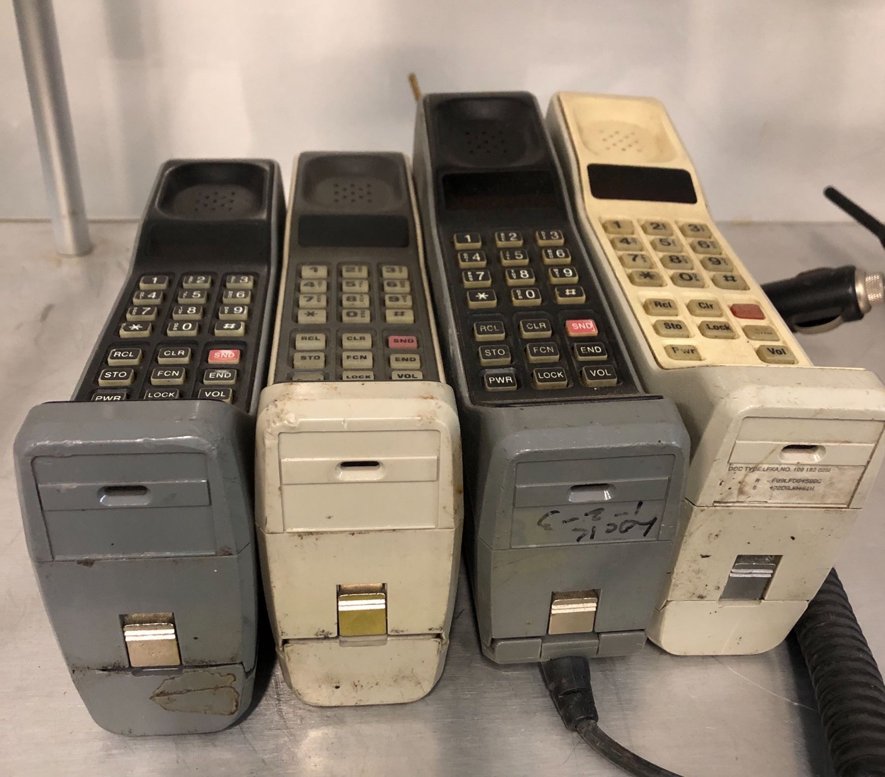 Group of four assorted collectable vintage Motorola brick phones (first ...