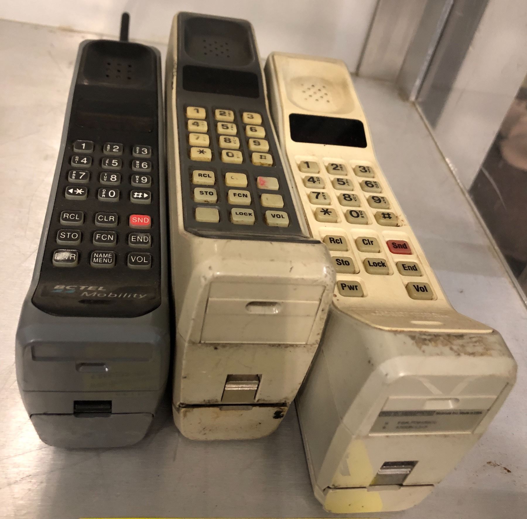 Group of three assorted collectable vintage Motorola brick phones ...