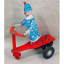 VINTAGE BUDAPEST TIN CLOWN ON TRIKE