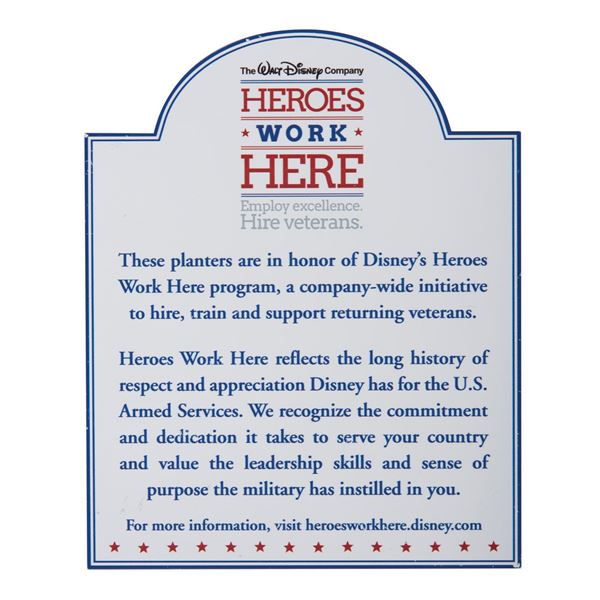 A "Heroes Work Here" Sign.