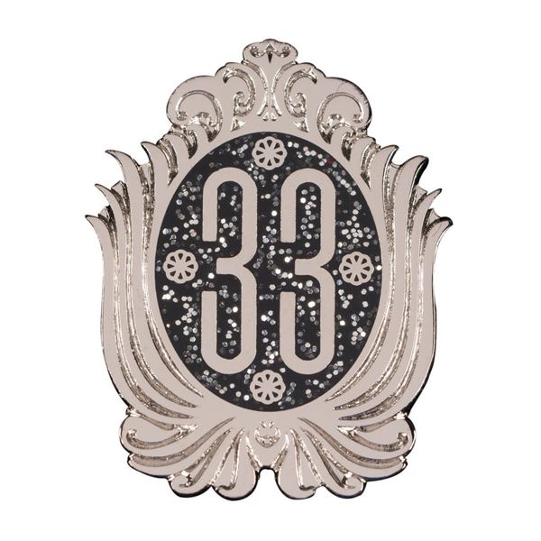 A Club 33 Silver Logo Pin.