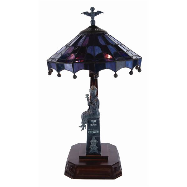 A Haunted Mansion Stretching Portrait Lamp.