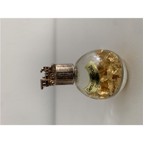 Decorative ball with gold flakes