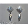 Image 1 : LARGE WHITE SHELL PIERCED EARRINGS