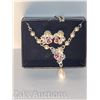 Image 1 : ROSE AND PEARL EARRINGS AND Y NECKLACE