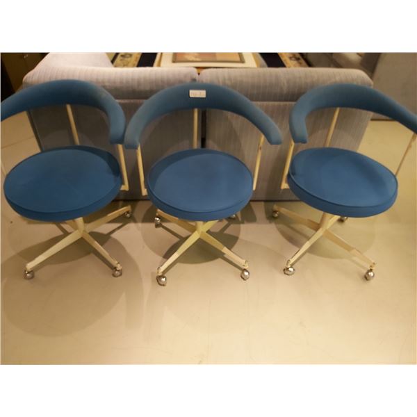 Three Rolling Chairs