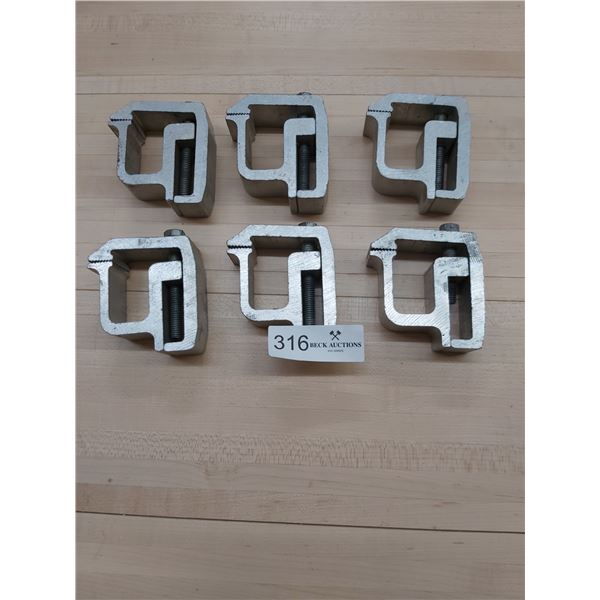 Six Truck Cap Clamps