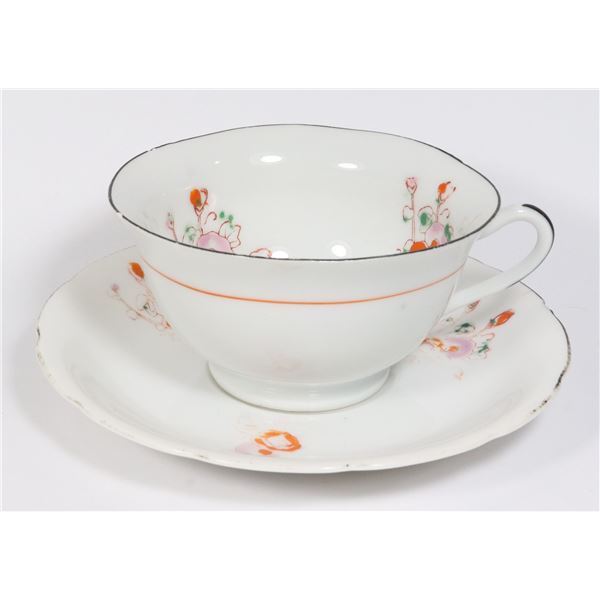 ORANGE FLOWER TEACUP AND SAUCER