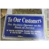 Image 3 : mirror, customer service sign and plastic sheets