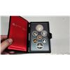 Image 1 : 1982 Double Dollar Proof Set. 7-coin set includes Silver Dollar that commemorates the 100th Annivers