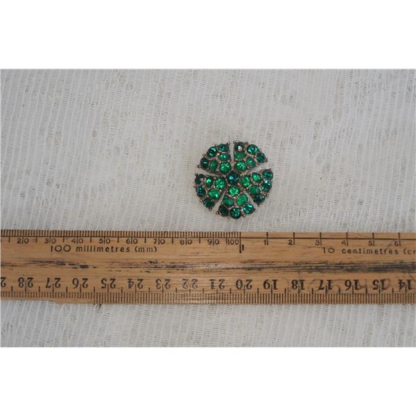 Emerald Green coloured brooch  pring set glass stones