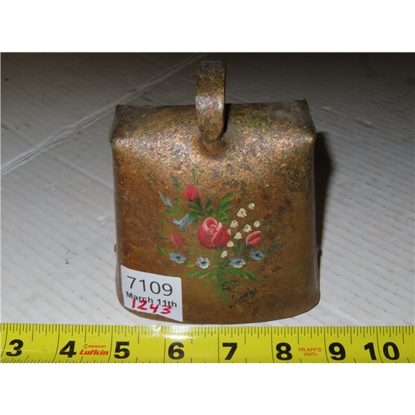 Cow bell with flower decoration