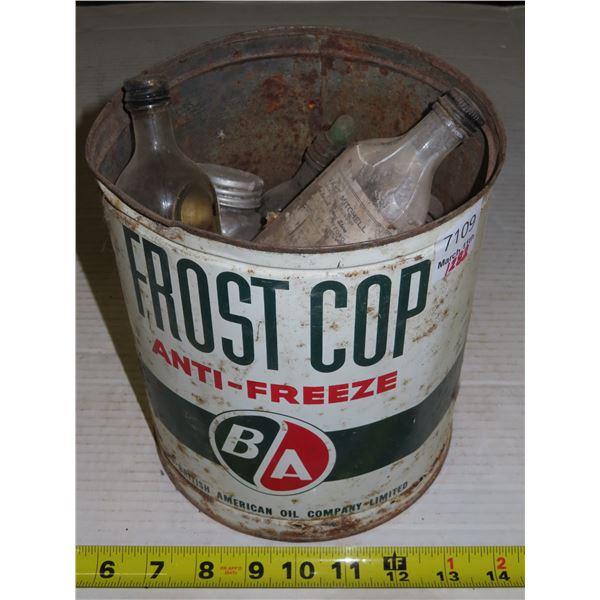 Frost Cop Anti-Freeze pail with old bottles inside