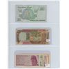 Image 5 : Binder of World Notes:  35 bills (approx. 16 countries incl. Guyana, Angola, Bahrain, Egypt, Nigeria