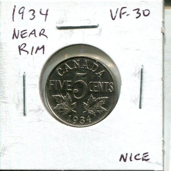 1934 Canadian Nickel 5 Cents. Near Rim Variety (S is Near the Rim). VF-30. Nice.