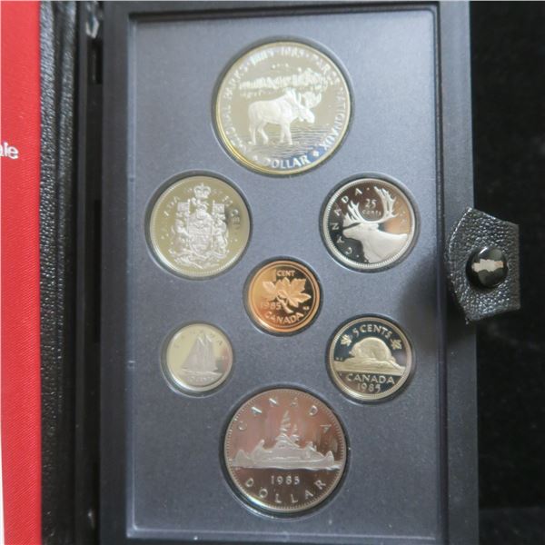 1985 Proof Set. 7-coin set includes Silver Dollar that commemorates the 100th Anniversary of the Nat