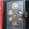Image 1 : 1985 Proof Set. 7-coin set includes Silver Dollar that commemorates the 100th Anniversary of the Nat