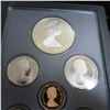 Image 5 : 1985 Proof Set. 7-coin set includes Silver Dollar that commemorates the 100th Anniversary of the Nat