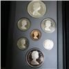 Image 2 : 1986 Proof Set. 7-coin set includes Silver Dollar that commemorates the 100th Anniversary of Vancouv