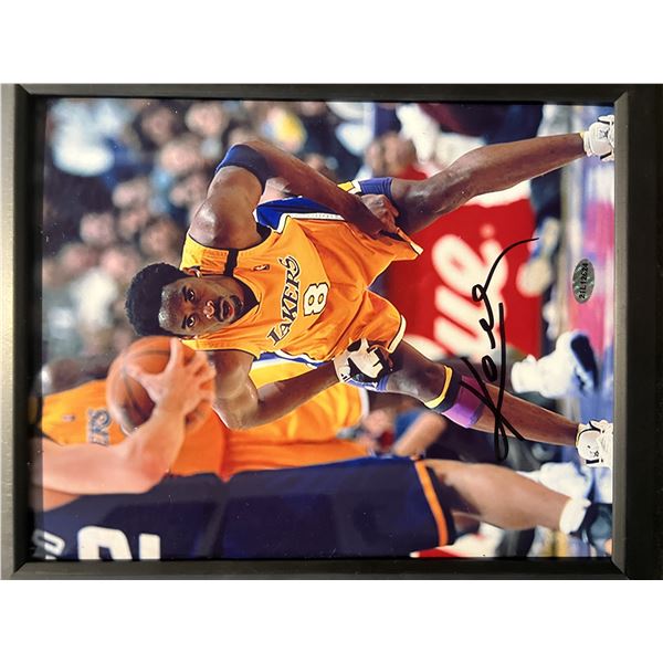 Kobe Bryant signed photo. SCM authenticated