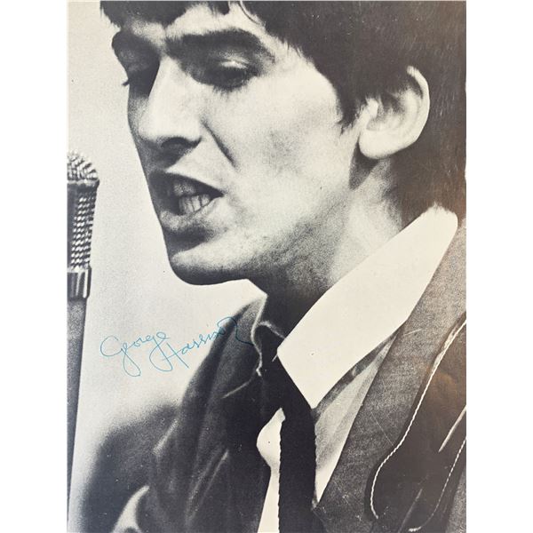 George Harrison signed magazine page